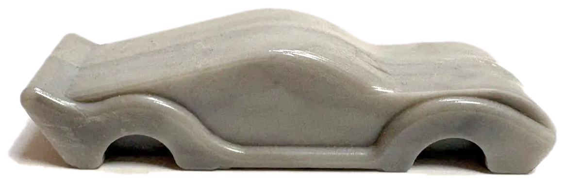 Molded gray car, side view
